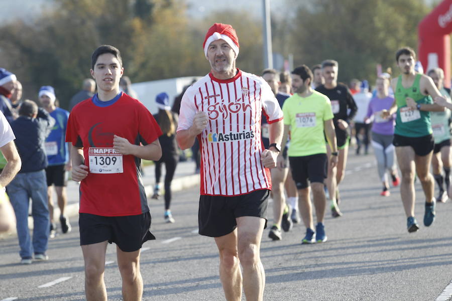 Fotos: ¿Estuviste en la Carrera Ppopular de Nochebuena? ¡Búscate!