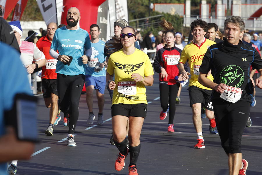 Fotos: ¿Estuviste en la Carrera Ppopular de Nochebuena? ¡Búscate!