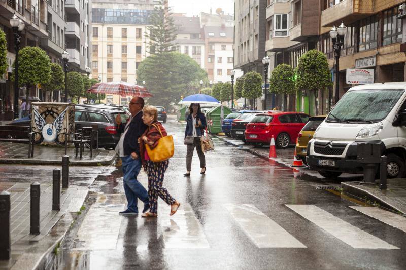Fotos: Temperaturas otoñales y de intensas lluvias en Asturias