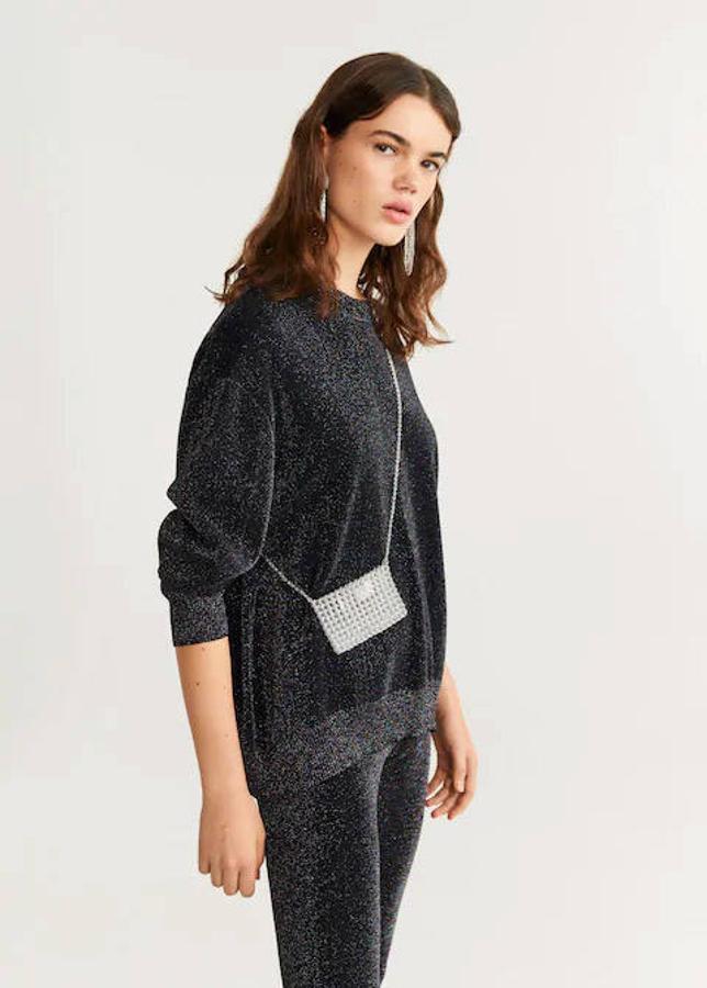 Jersey con hilo metalizado oversize de Mango (19,99 euros).