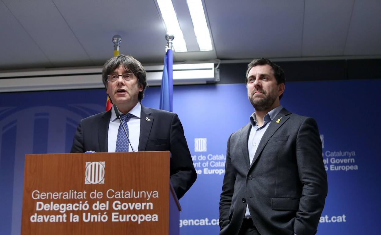 Carles Puigdemont y Toni Comín. 