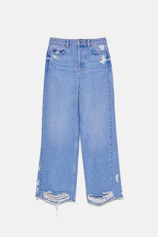 Jeans Z1975 wide leg con rotos en la parte delantera y en el bajo de Zara, 25,95 euros.