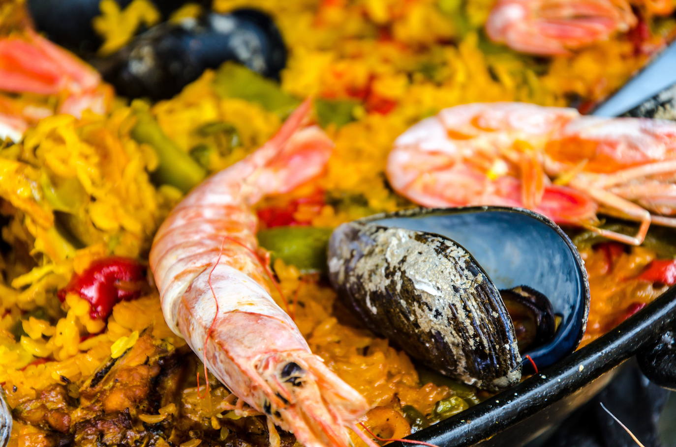 La paella figura en la selección de tapas recomendadas en el porta turístico de España