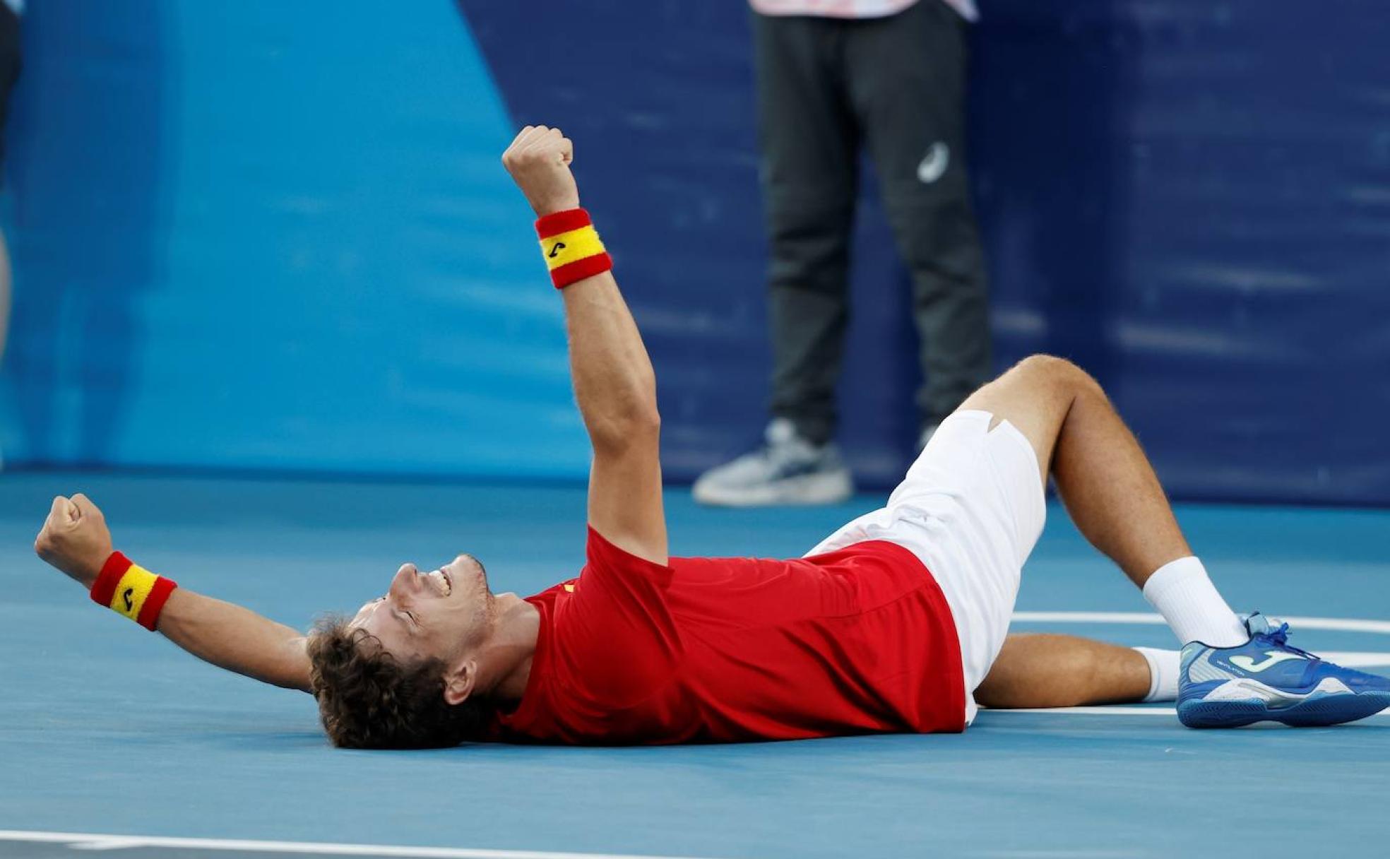 Pablo Carreño celebra la victoria frente a Djokovic.