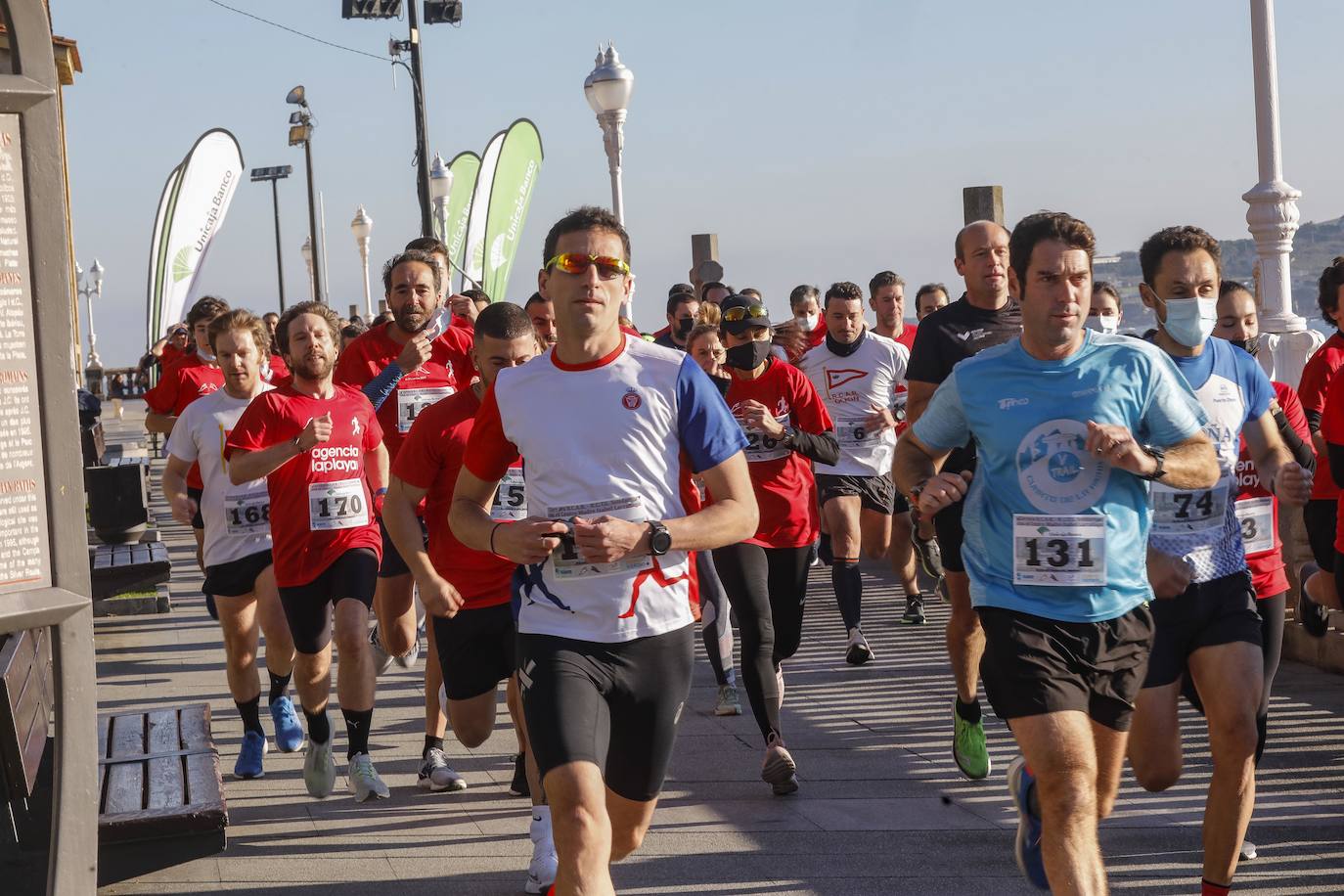 Fotos: Marcos Peón e Inés de Diego ganan la Carrera Solidaria Club de Regatas-Tenis
