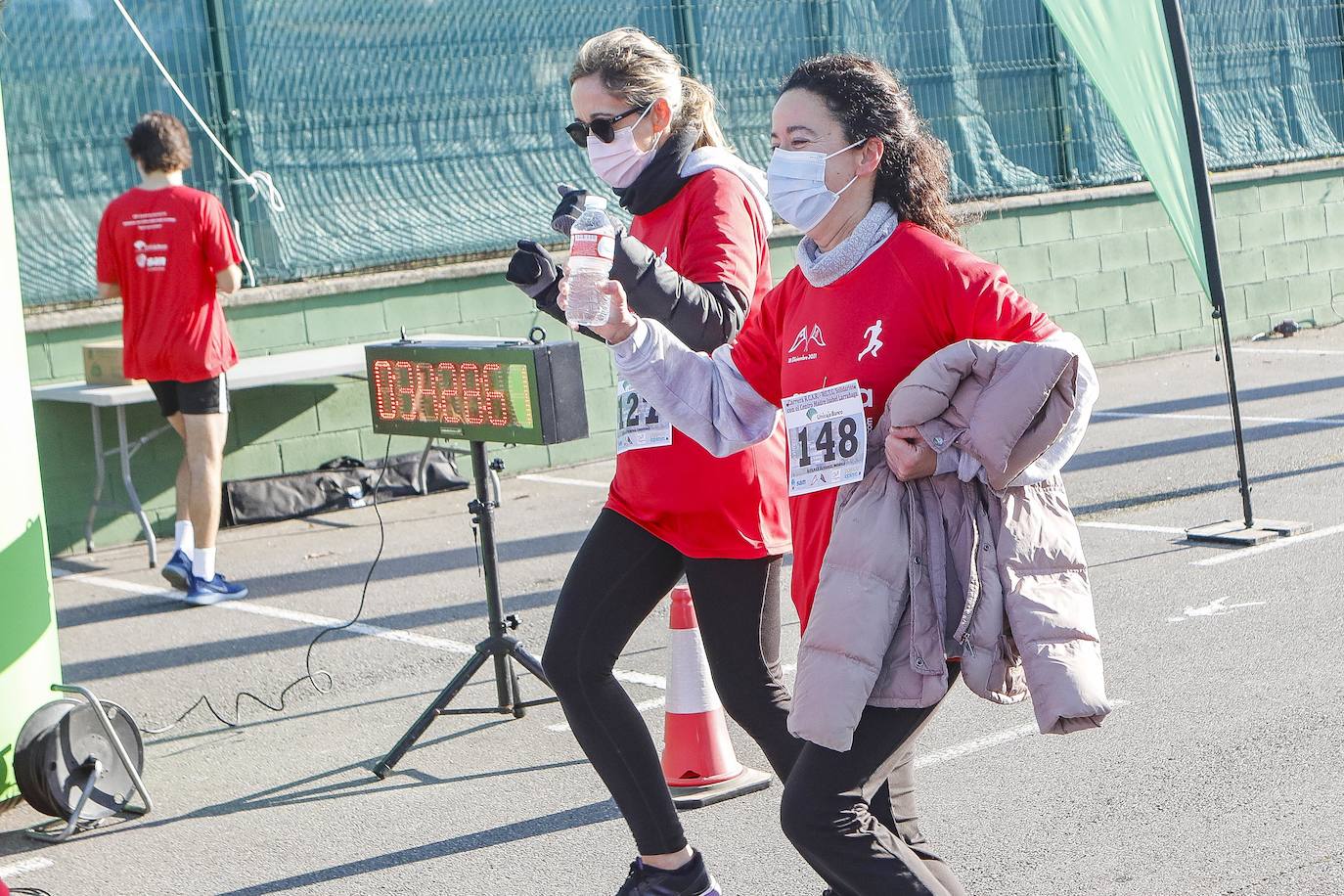 Fotos: Marcos Peón e Inés de Diego ganan la Carrera Solidaria Club de Regatas-Tenis