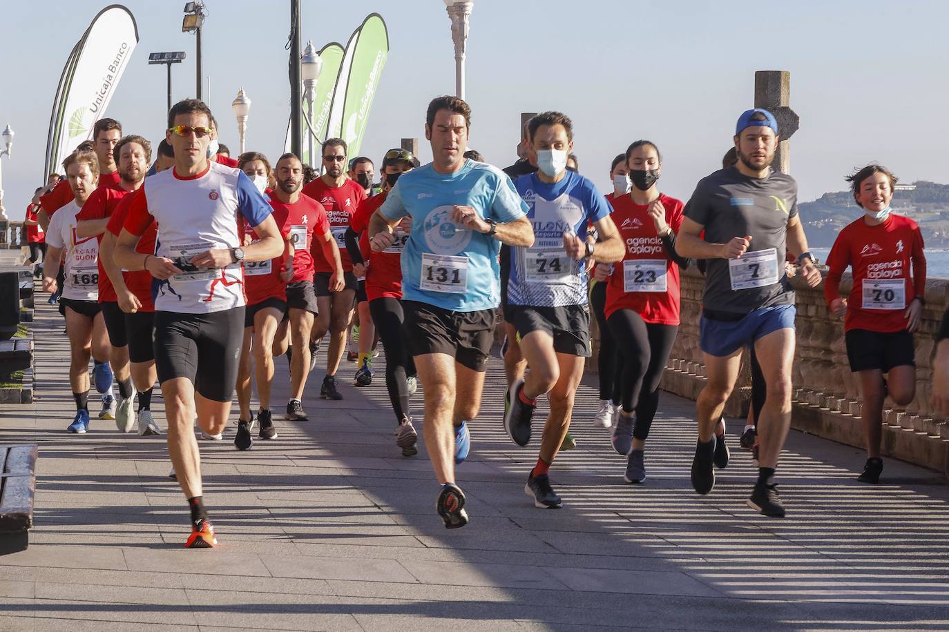 Fotos: Marcos Peón e Inés de Diego ganan la Carrera Solidaria Club de Regatas-Tenis