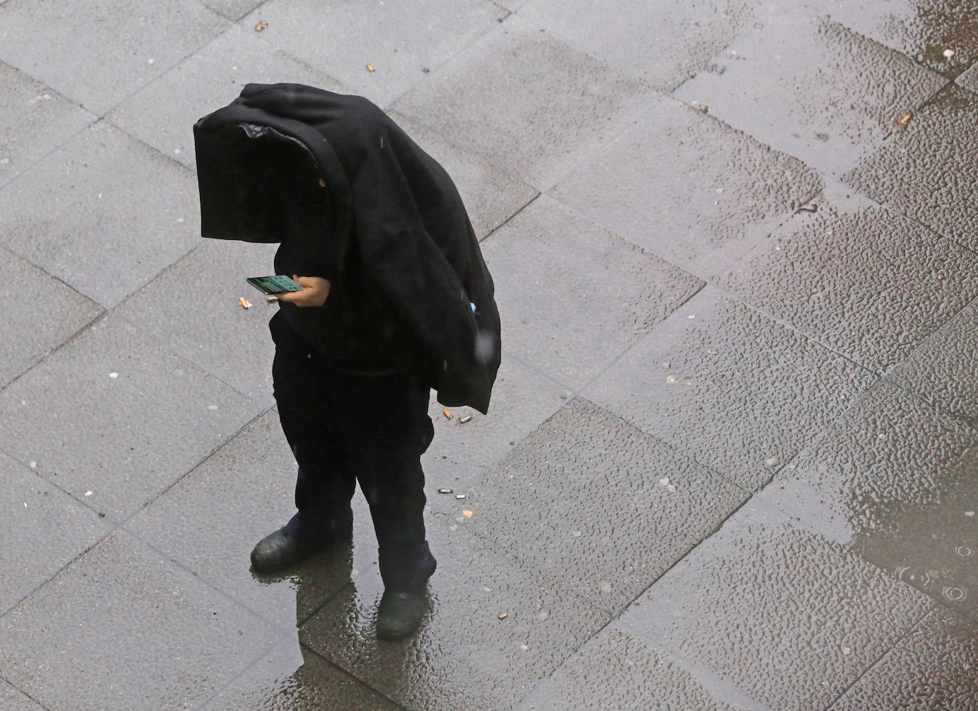 Fotos: Un frente cálido deja este lunes lluvias por toda la región