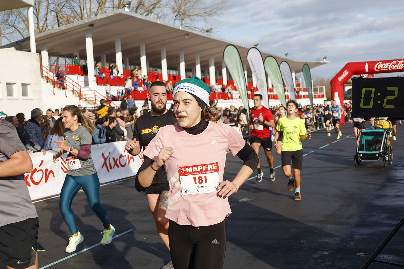 Fotos: ¿Participaste en la Carrera de Nochebuena de Gijón? ¡Búscate!