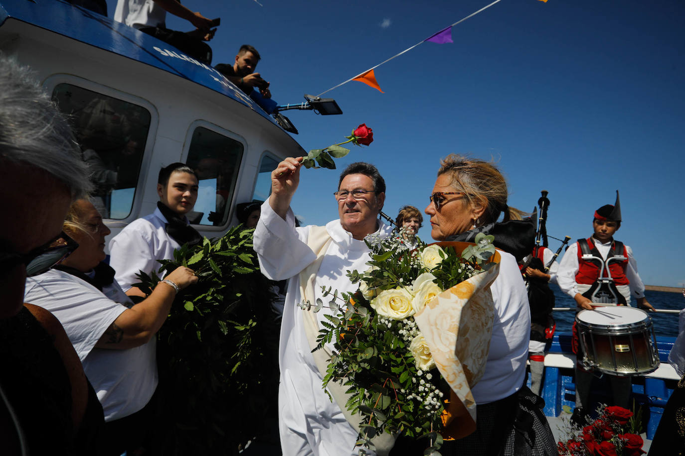 Procesión marinera en Gijón para recordar a los que ya no están