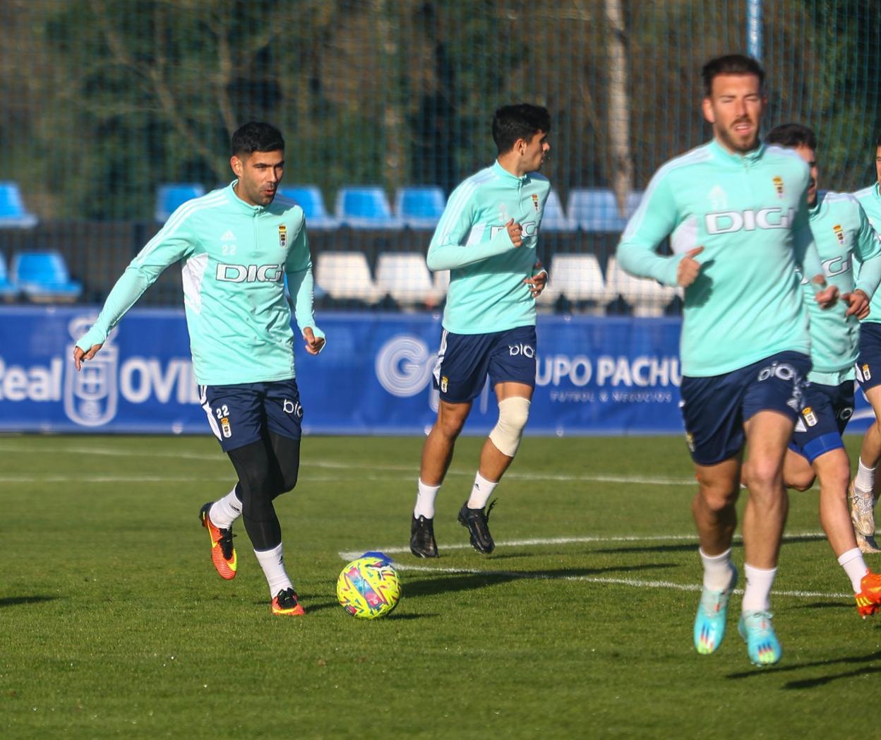 Juanfran, en la sesión de ayer, junto a Mangel. 