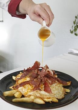 Imagen - Plato de huevos rotos elaborado en Casa Chema.