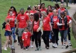 Marcha solidaria de Cruz Roja esta mañana en Gijón.