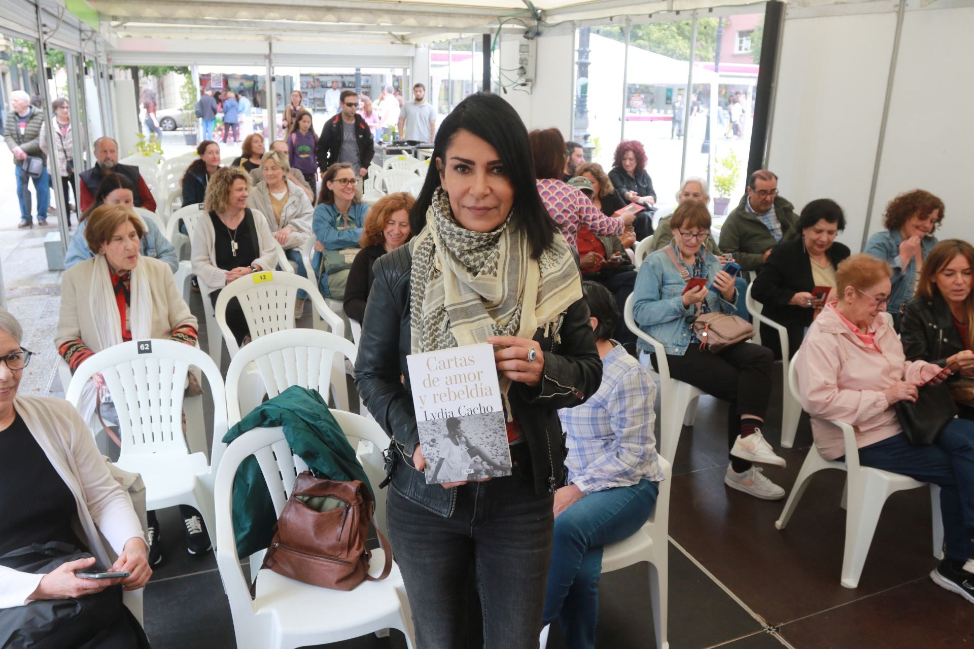 Las imágenes que deja la Feria del Libro en Gijón este sábado