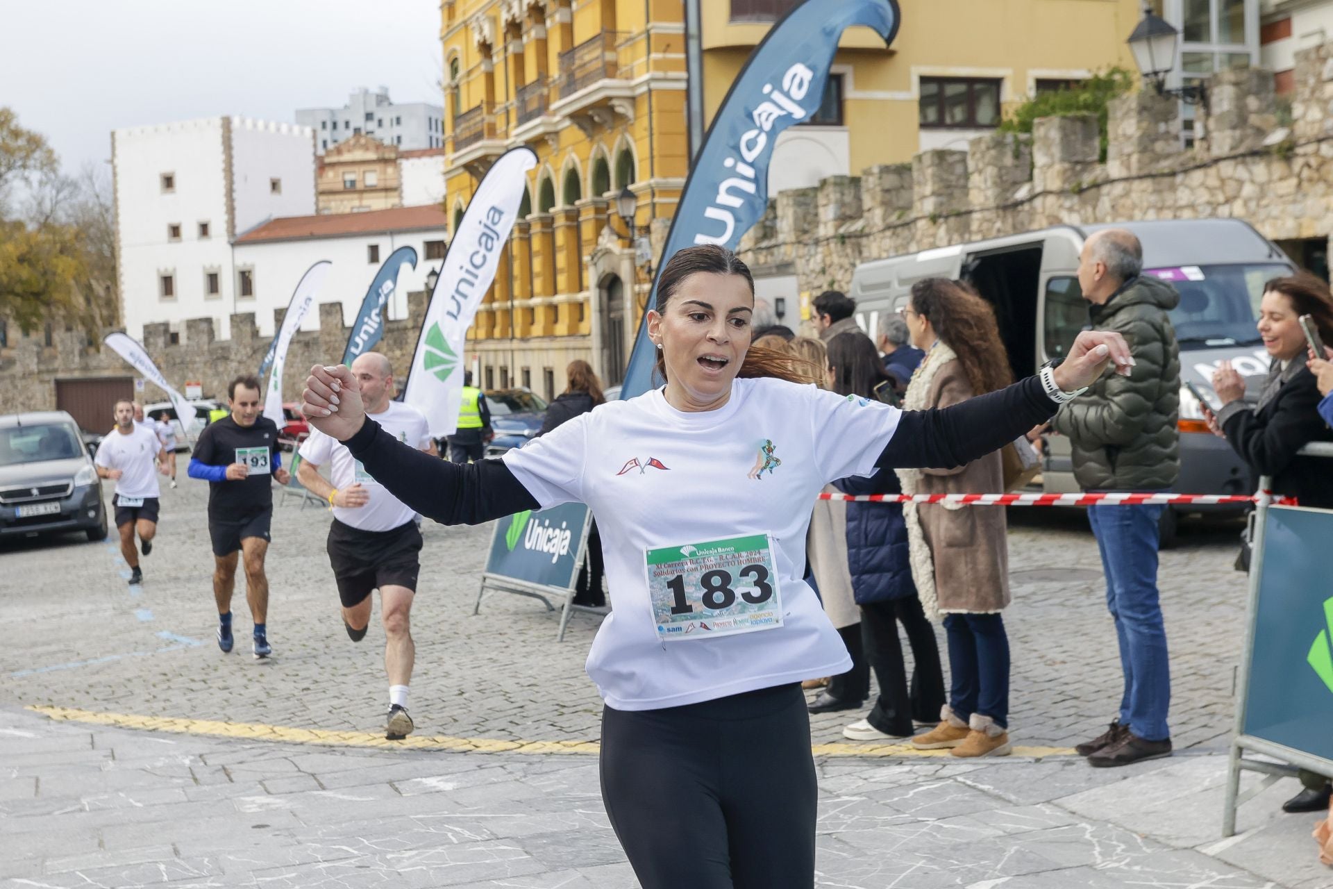 La carrera entre el club de Tenis y el club de Regatas de Gijón, en imágenes