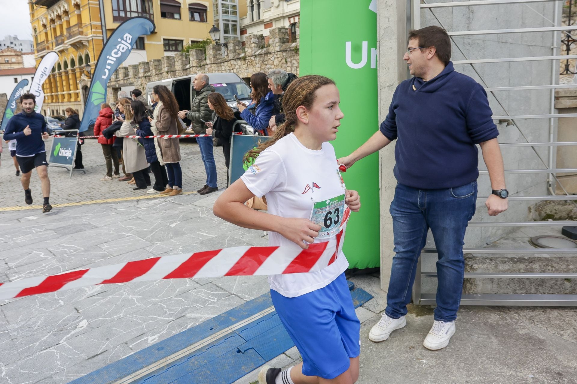 La carrera entre el club de Tenis y el club de Regatas de Gijón, en imágenes