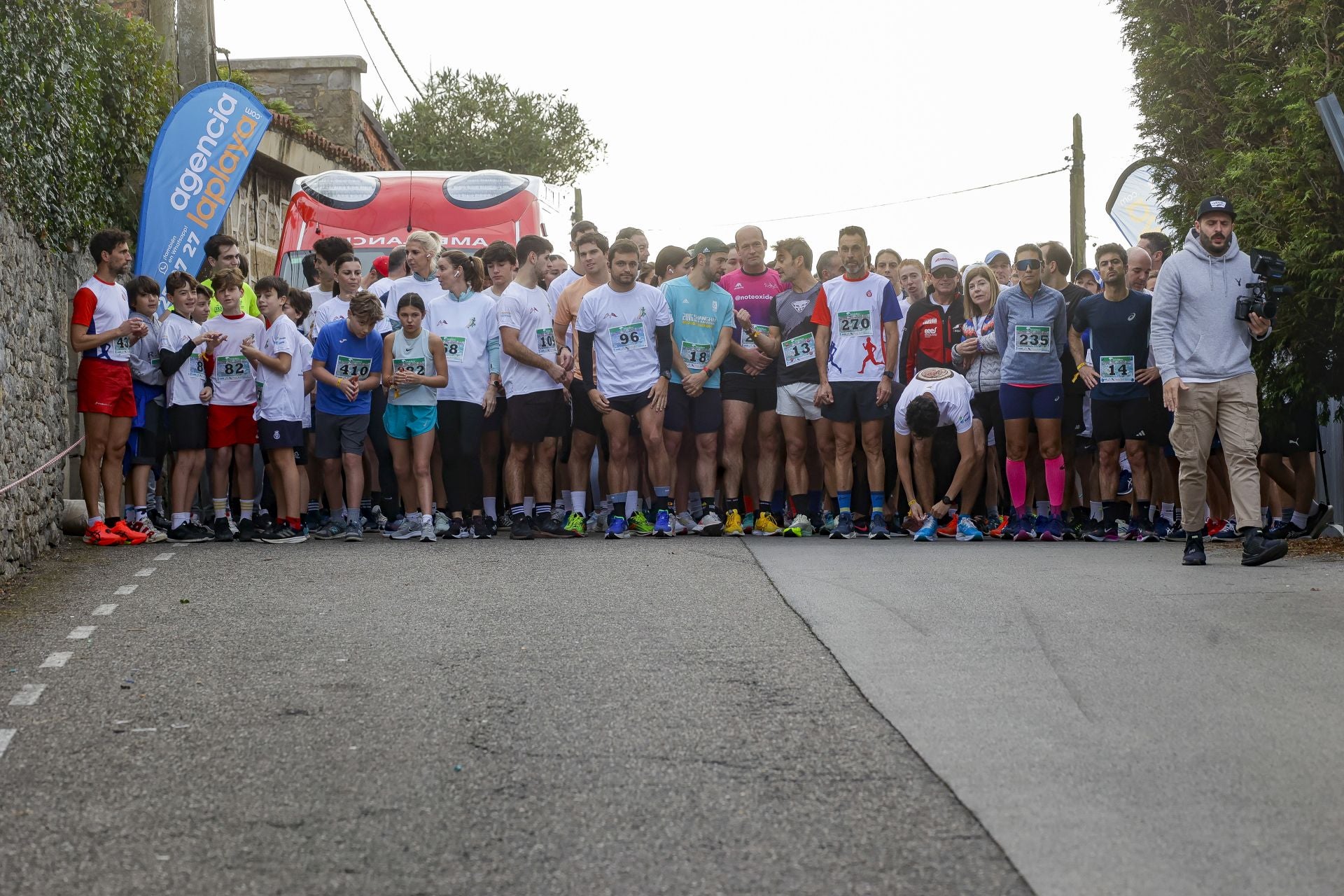 La carrera entre el club de Tenis y el club de Regatas de Gijón, en imágenes