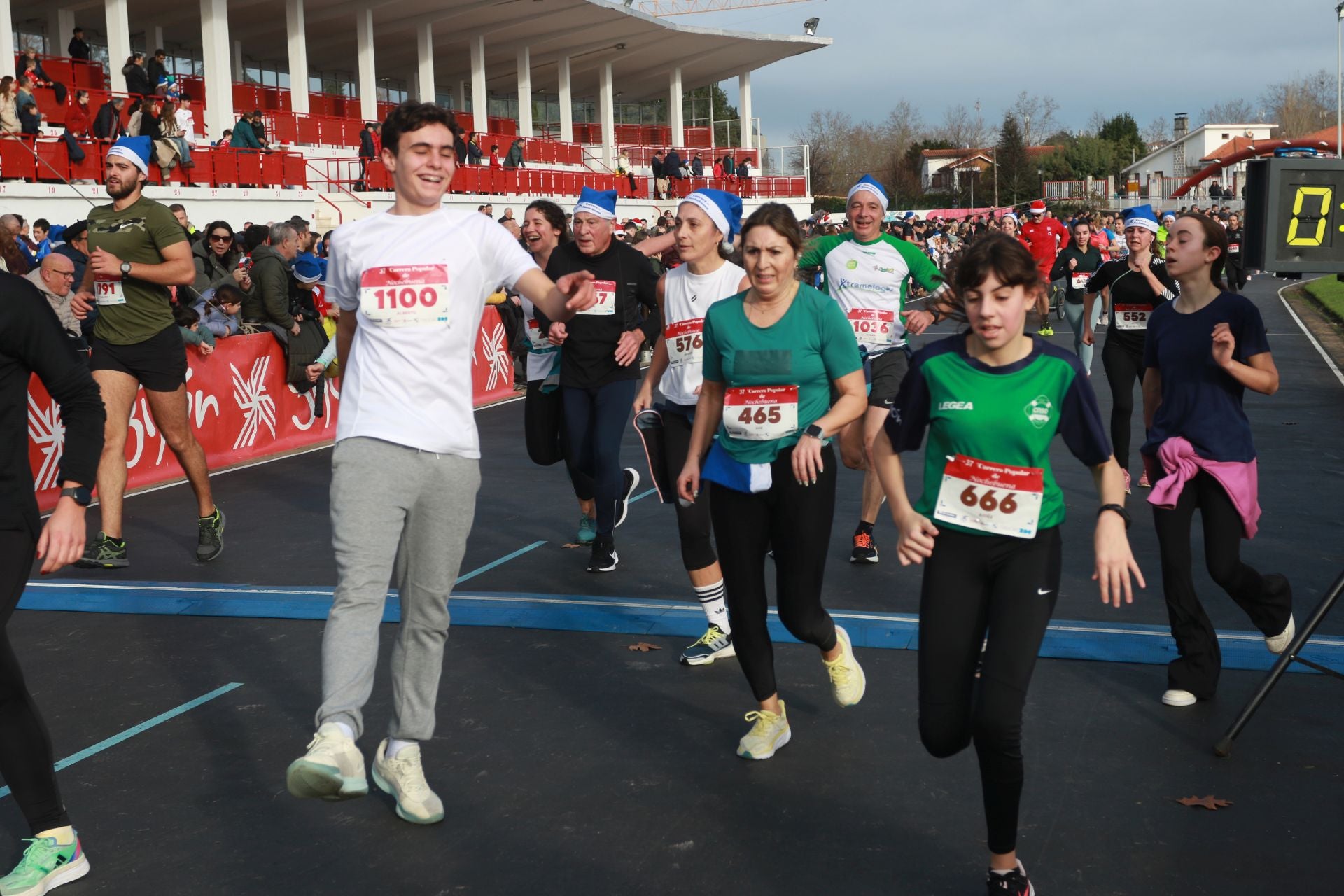 Una carrera mañanera para empezar la Nochebuena en Gijón