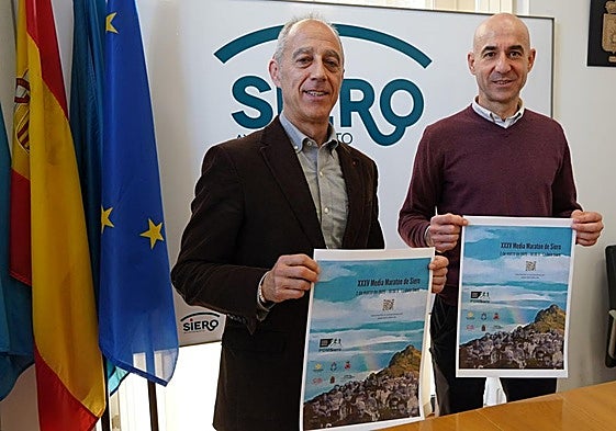 Jesús Abad y Virginio Ramírez, con el cartel de la prueba.