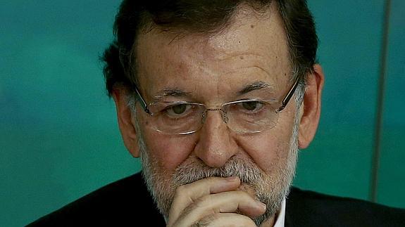 Rehn avala el plan de estímulo anunciado por Rajoy pero pide más reformas en el mercado laboral