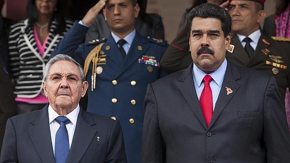 Raúl Castro y Nicolás Maduro. 