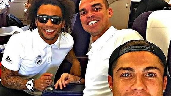 Marcelo, Pepe y Cristiano en su llegada a Madrid. 