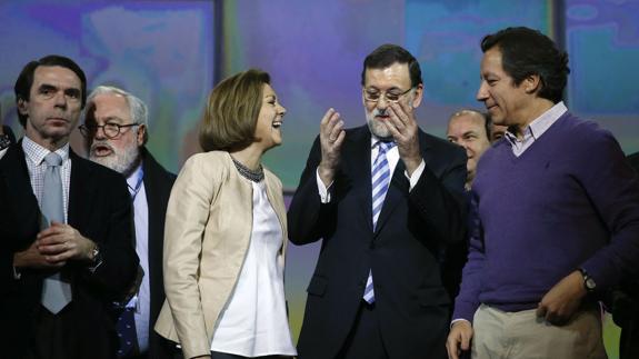 Aznar (izq.) y Rajoy (dcha.).