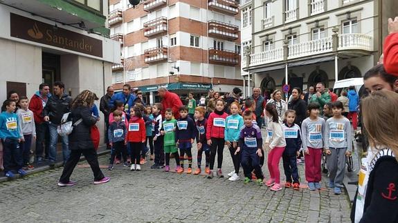 Las imágenes de la San Silvestre de Cudillero.