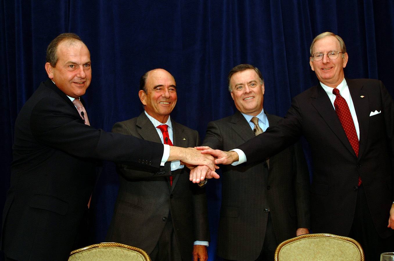 Juan Rodríguez Inciarte y Emilio Botín, del Banco Santander, junto a Ken Lewis y Jim Hance, de Bank of America en el año 2002.