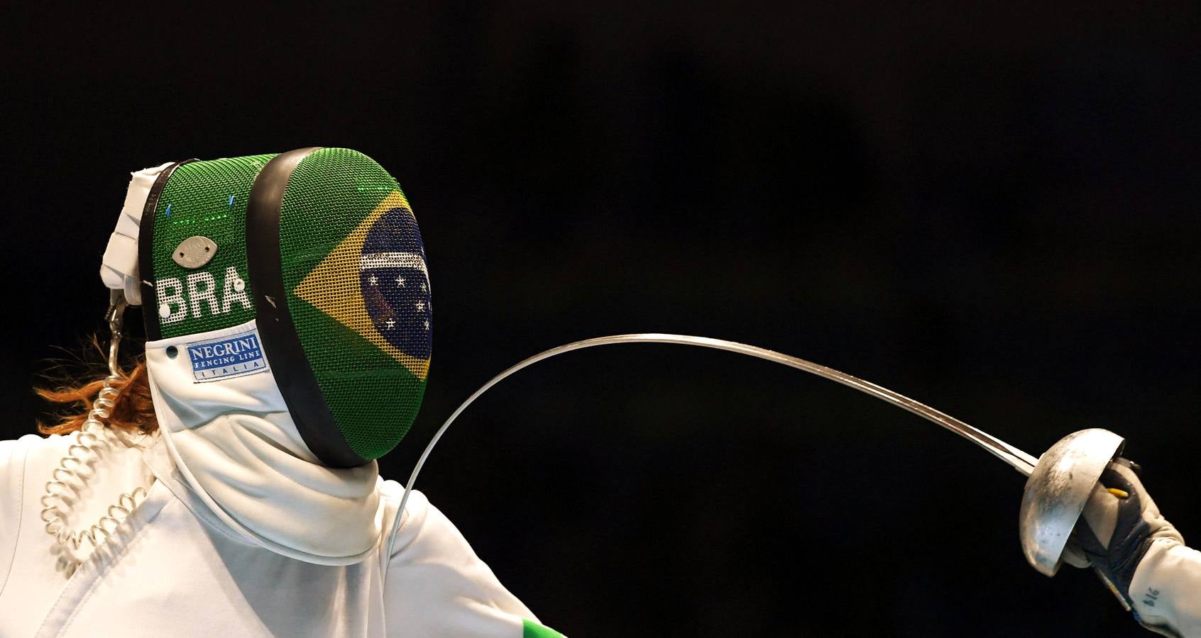 La brasileña Nathalie Moellhausen compitiendo contra la ucraniana Kseniya Pantelyeyeva.