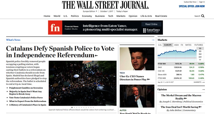 El diario estadounidense Wall Street Journal abre la web con ello y titula: "Los catalanes desafían a la policía española para votar en el referéndum de independencia".