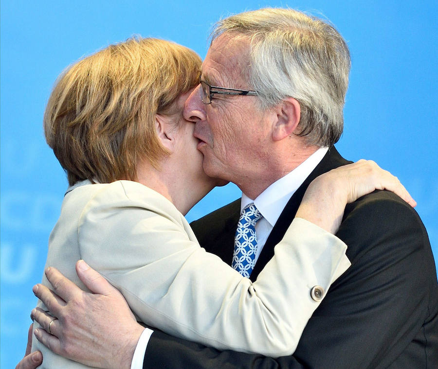 Jean-Claude Juncker y la canciller alemana Angela Merkel.