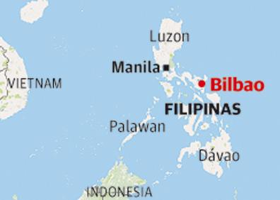 Imagen secundaria 1 - La escuela de secundaria de Bilbao y las colinas situadas en la boca de la bahía de Calanaga, donde se encuentra la población.