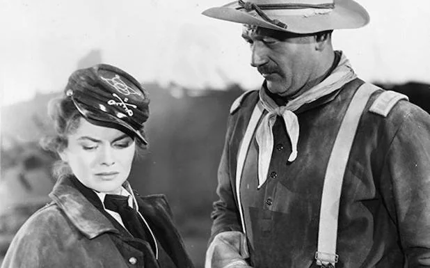 John Wayne y Joanne Dru en una escena de 'La legión invencible' (1949).