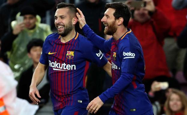 Jordi Alba y Leo Messi. 