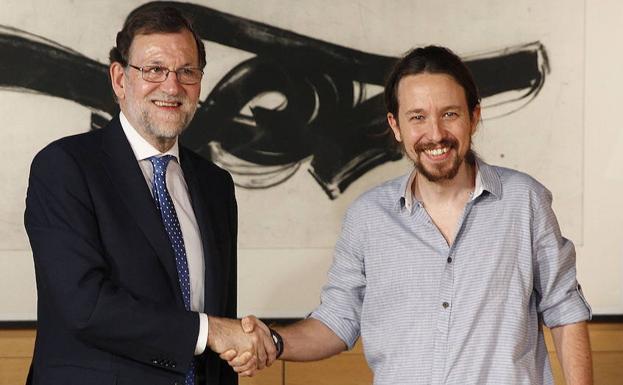 Rajoy e Iglesias.