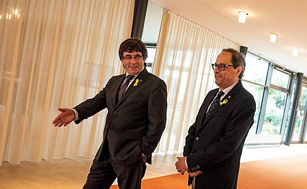 Puigdemont y Torra.