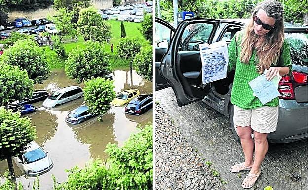 Vehículos atrapados en el aparcamiento inundado tras la tromba. En la foto de arriba una mujer recoge del coche documentos empapados de agua. 