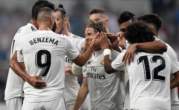 El Real Madrid celebrando el tercer gol del equipo