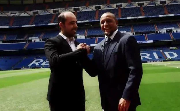 Néstor y Roberto Carlos, durante su encuentro en Madrid. 