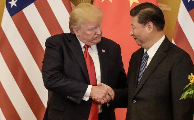 Donald Trump y Xi Jinping en una conferencia celebrada en Beijing.