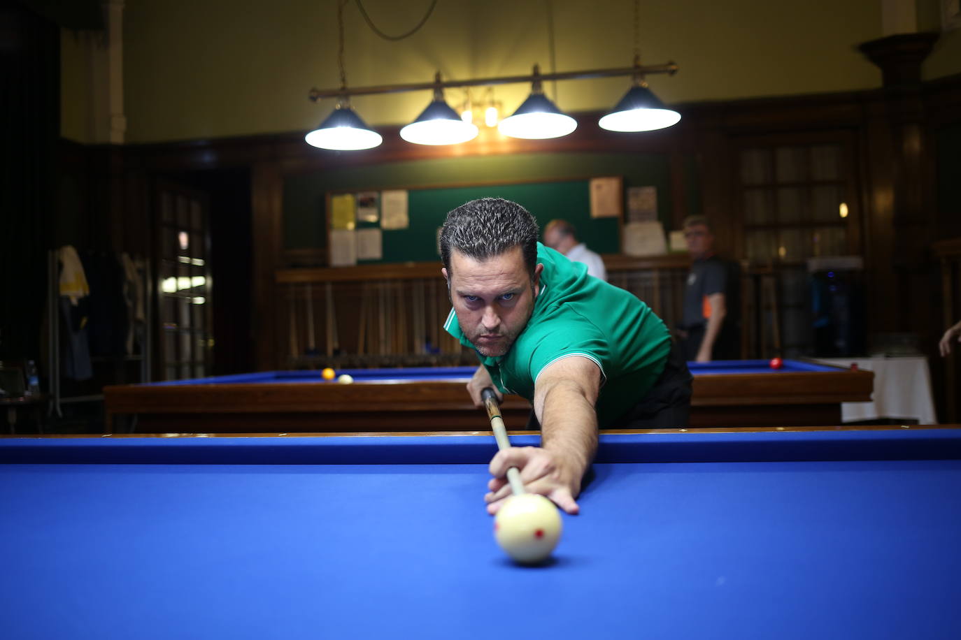 Los participantes en el torneo de billar.