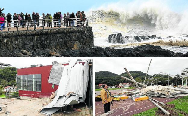 El mar lanza sus acometidas contra el paseo de Bakio, donde las fuertes rachas destrozaron una carpa y la cubierta del frontón.