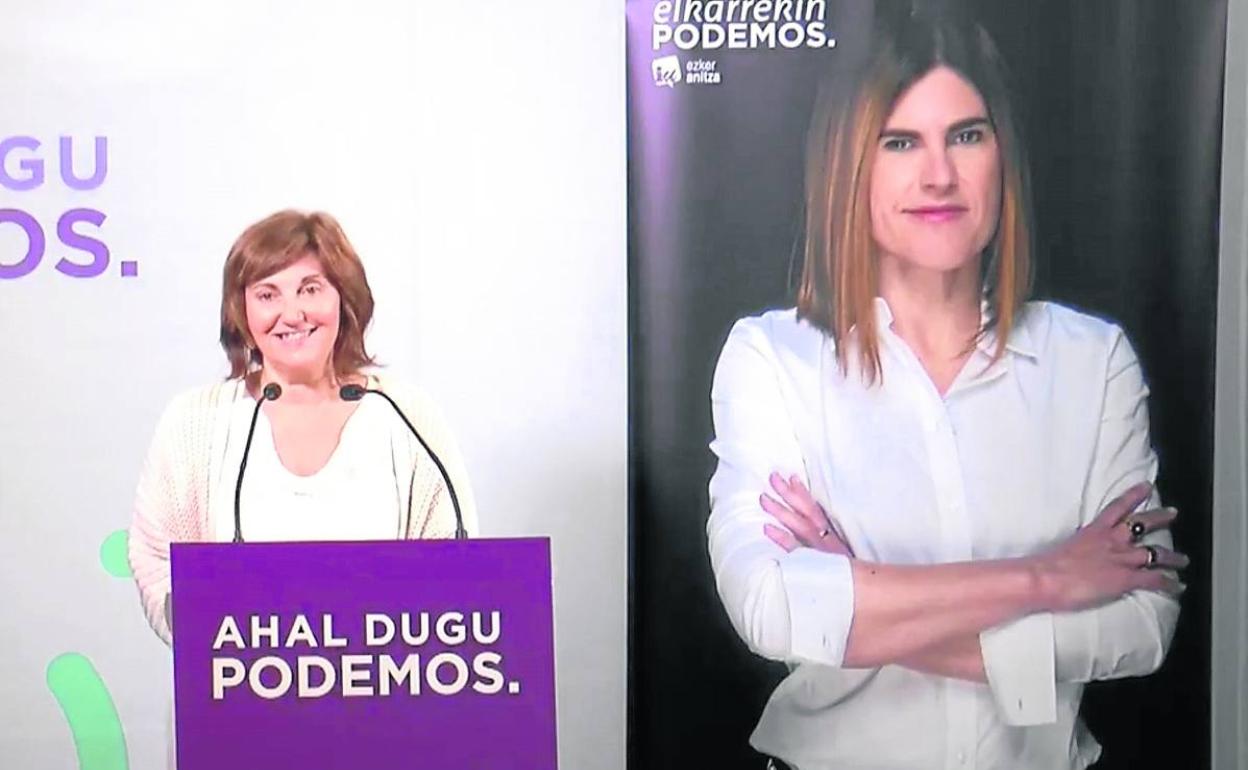 Pilar Garrido, líder de Podemos Euskadi, junto a un cartel electoral de Miren Gorrotxategi.