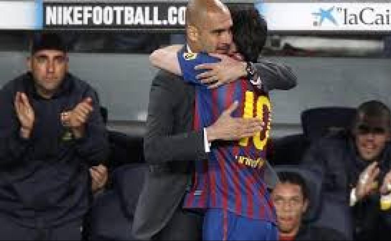 Pep Guardiola y Leo Messi. 