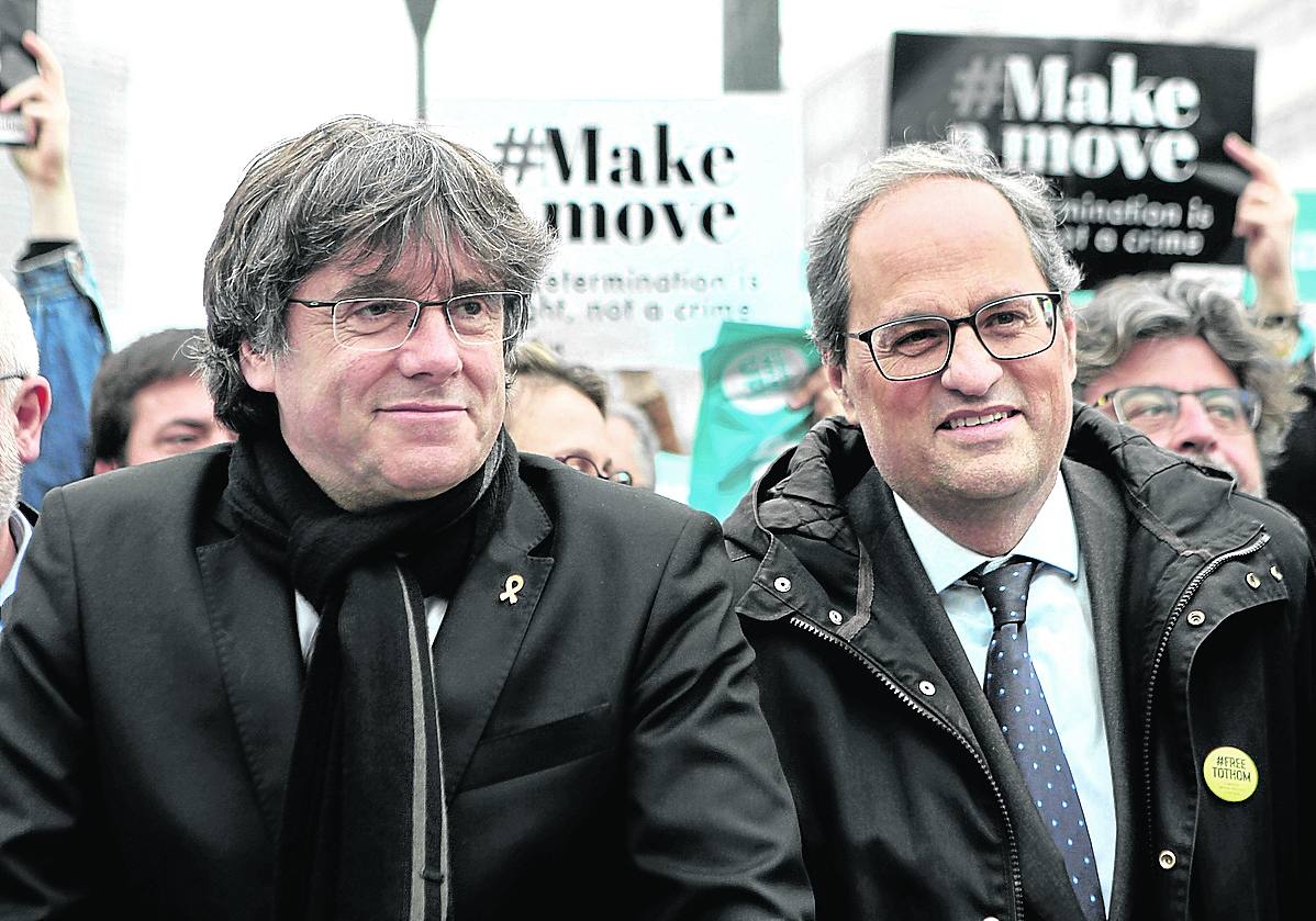 Carles Puigdemont y Quim Torra, en una concentración frente a la Comisión Europea en 2019.