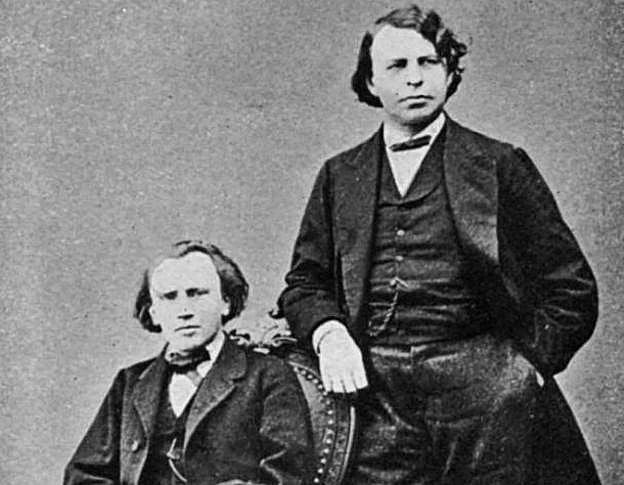 Johannes Brahms (sentado) y Joseph Joachim.