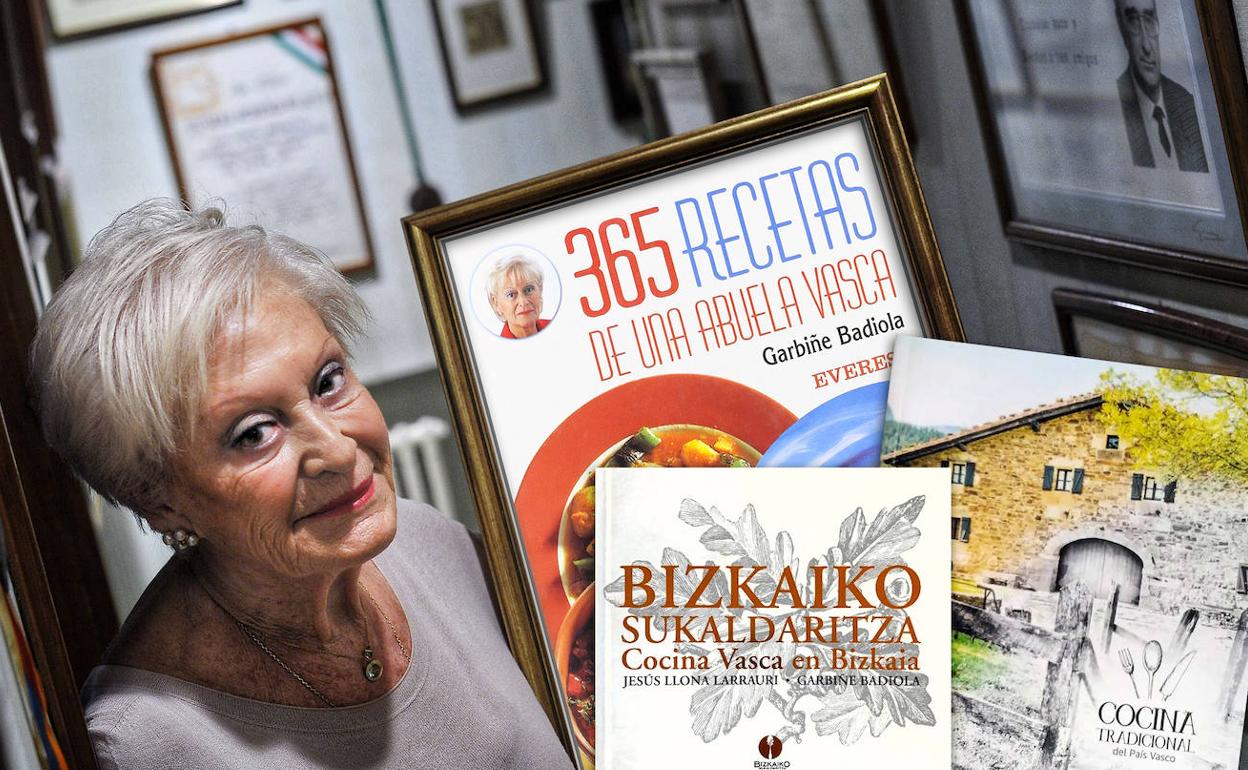 Fotografía de Garbiñe Badiola junto a las portadas de algunos de sus libros.