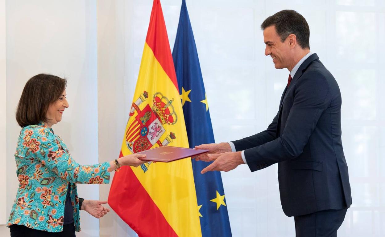 Pedro Sánchez y Margarita Robles. 