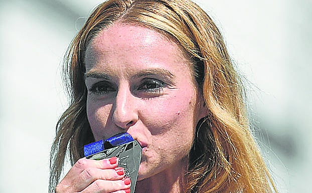 Imagen principal - Jornada de gloria para el atletismo español